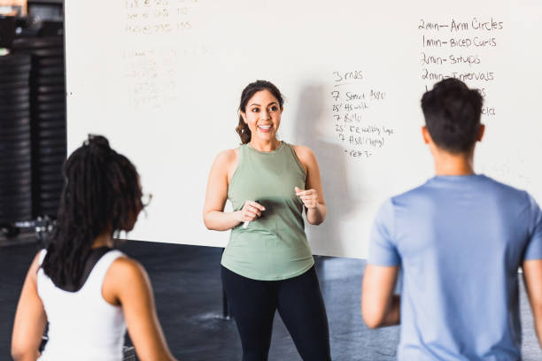 CrossFit instructor with group class